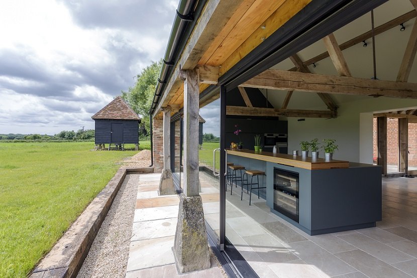 Open-air kitchen and backyard in modern home